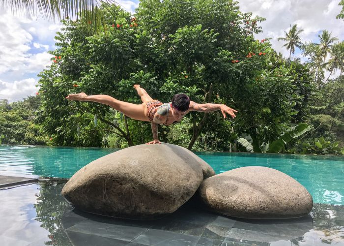 photo of tori balancing on rock yogi image