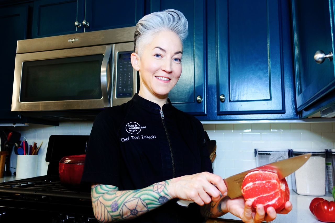 Tori cutting grapefruit Tori cutting grapefruit